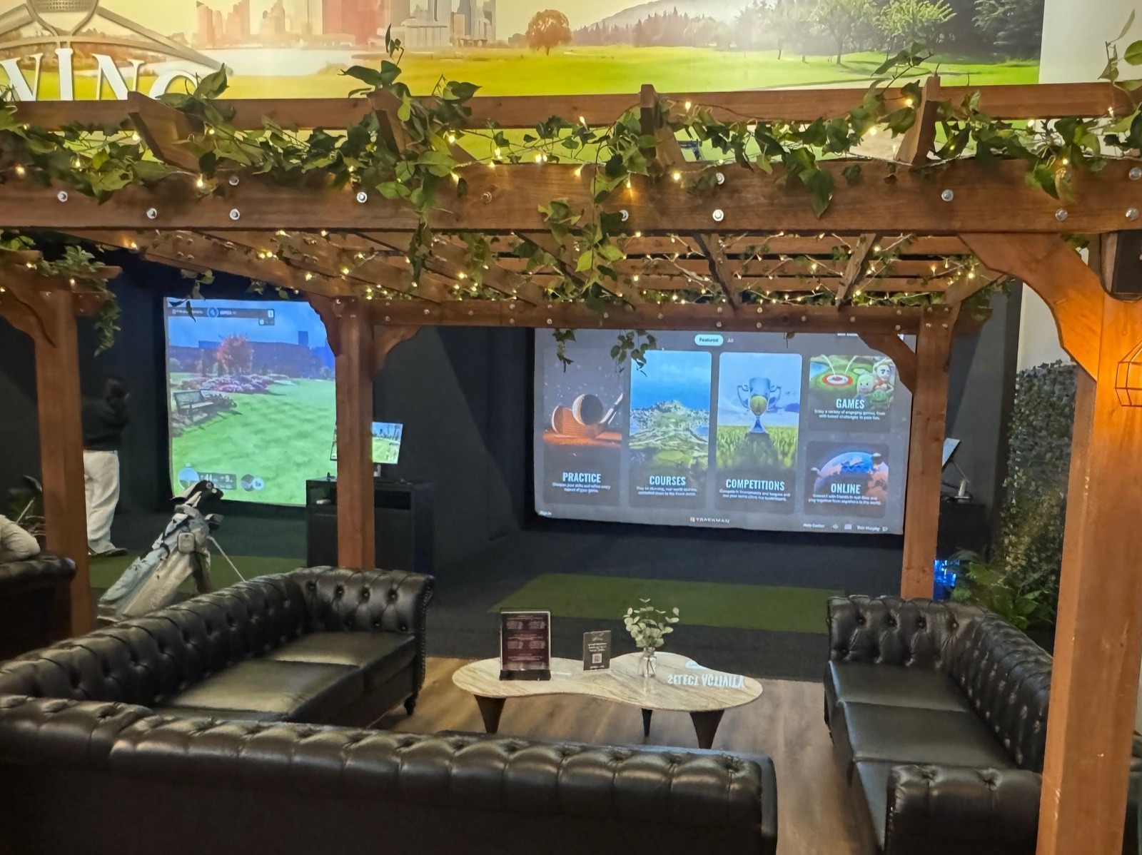 Golf simulator lounge with pergola seating at SWING Middletown