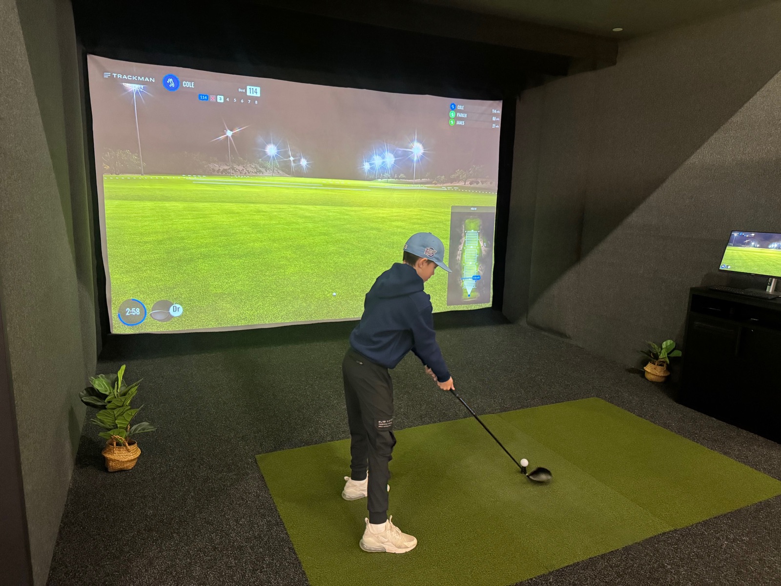 Kids golf simulator birthday party at SWING Middletown indoor sports complex